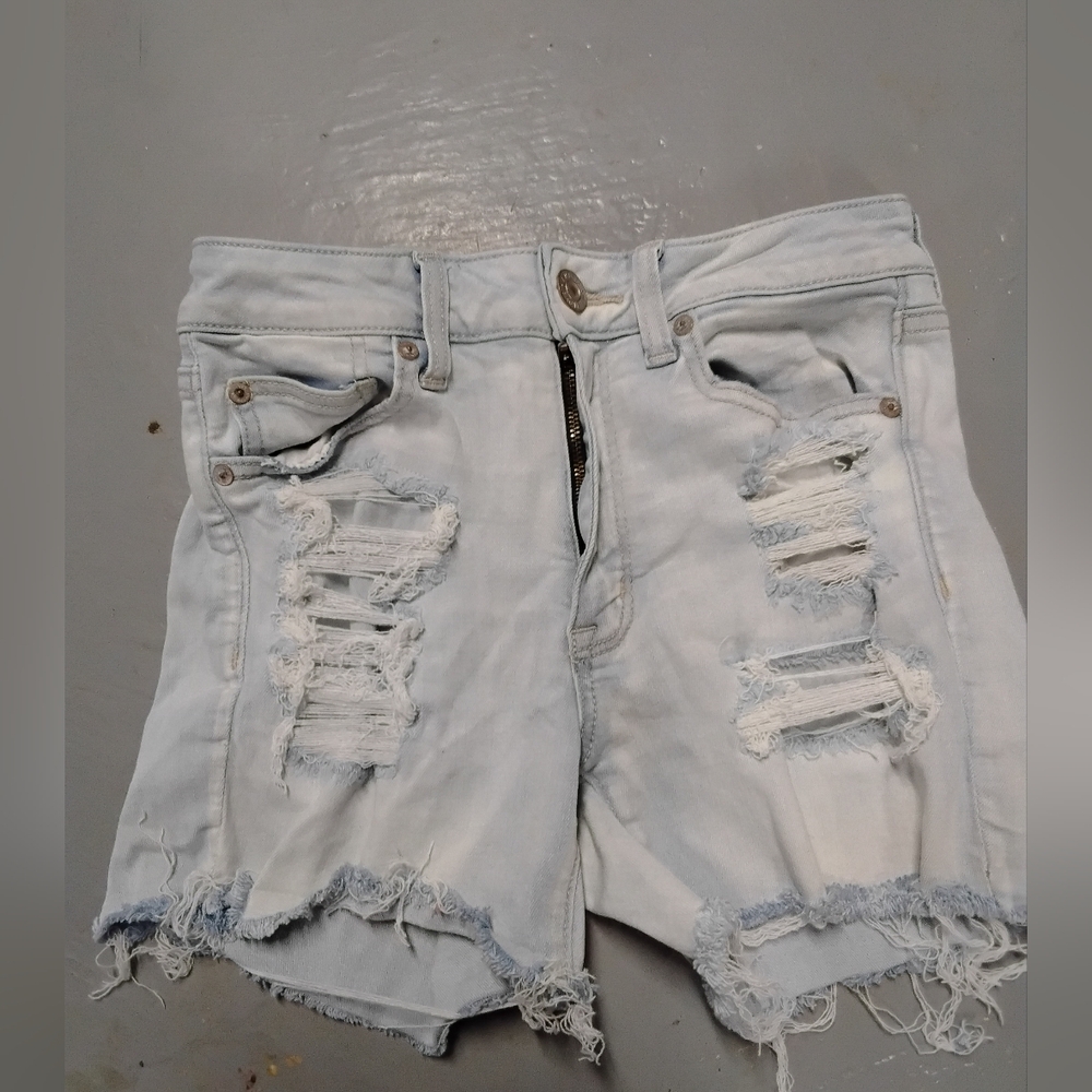 High-Rise Distressed Light Wash Denim Shorts Ameracen Egal